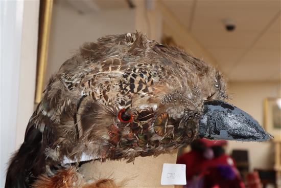 The Magic Flute: Papagenas pink, lilac and purple bodice with matching feather skirt and feathered bird headdress,